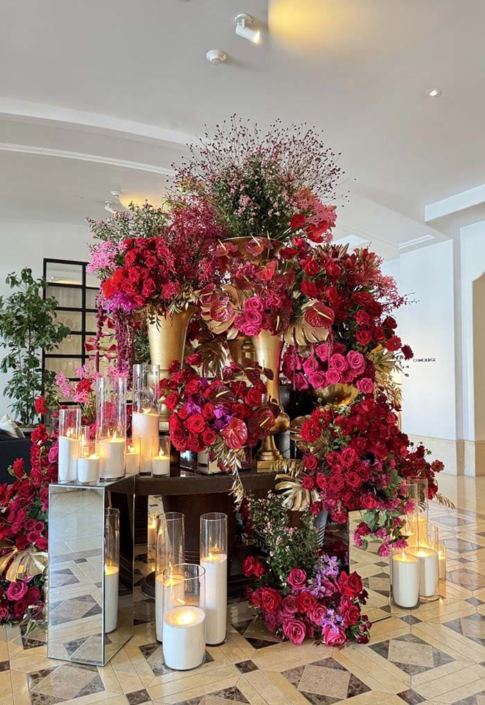 Decorative floral arrangement with candles in a stylish interior setting